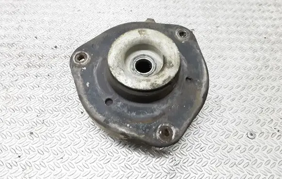 Volkswagen Touran I Front coil spring rubber mount 1K0412331