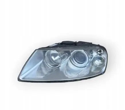Volkswagen Touareg I Headlight/headlamp 7L6941015CG