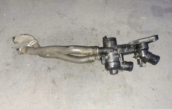 Thermostat/thermostat housing