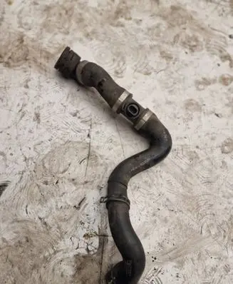 Volkswagen Touareg II Engine coolant pipe/hose 7P6122051G KA4131116