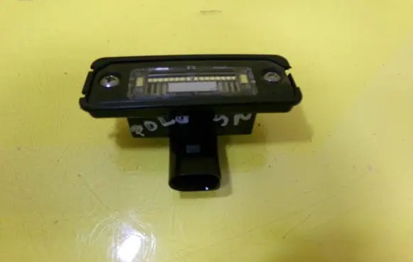 Volkswagen Polo IV 9N3 Number plate light 1J6943021B