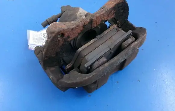 Opel Astra J Front brake caliper