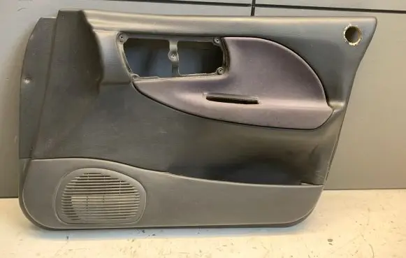 Subaru Impreza I Front door card panel trim