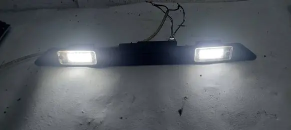 Audi A6 S6 C6 4F Trunk door license plate light bar 