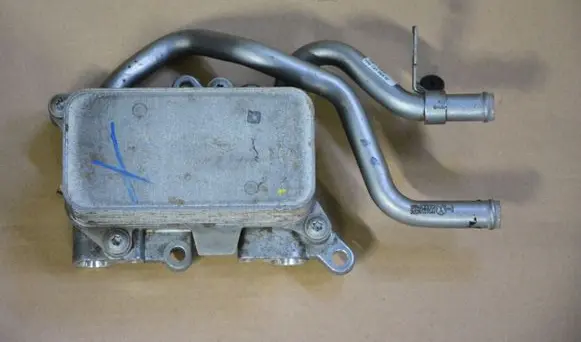 Volkswagen Touareg II Gearbox / Transmission oil cooler 7P0317037 7P0121065M
