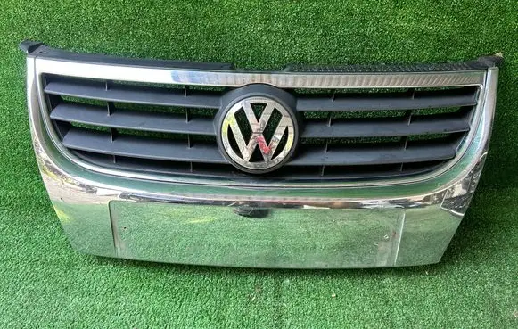 Volkswagen Touran I Front bumper upper radiator grill 1t085365