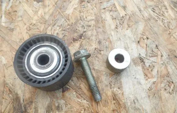 Renault Laguna II Timing belt tensioner 12377803 F12377803