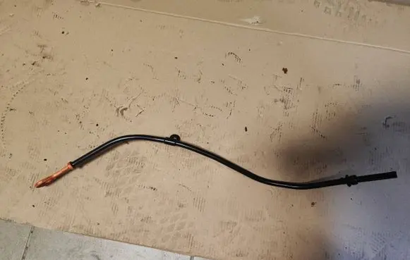 Oil level dip stick