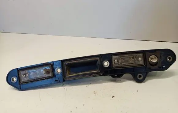 Volkswagen Jetta V Trunk door license plate light bar 1T0827573