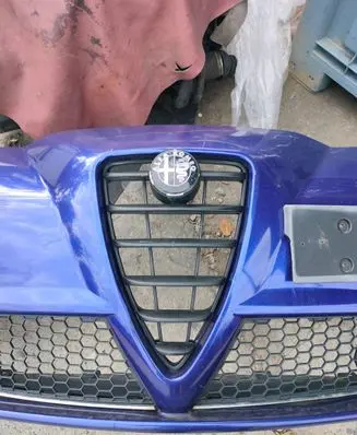 Alfa Romeo Mito Front bumper upper radiator grill 156078532