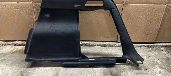 Trunk/boot lower side trim panel