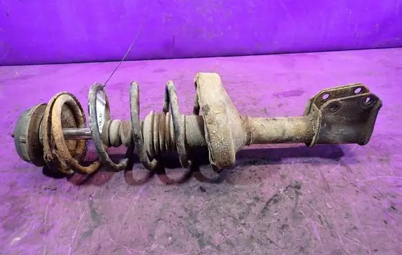 Renault Thalia I Front shock absorber with coil spring 