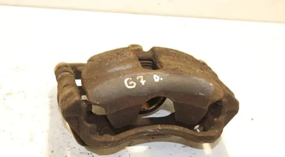 Volkswagen Golf VII Front brake caliper
