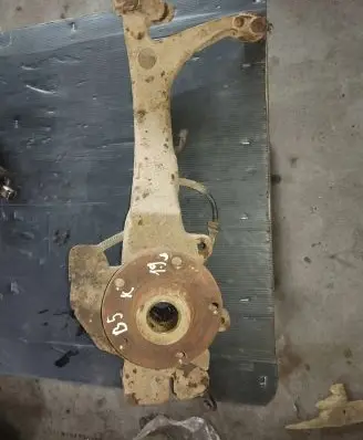 Volkswagen PASSAT B5 Front wheel hub spindle knuckle 8D0407257