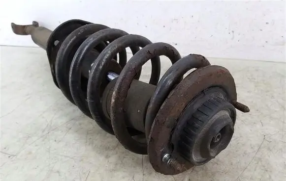 Volkswagen PASSAT B5 Front shock absorber with coil spring 
