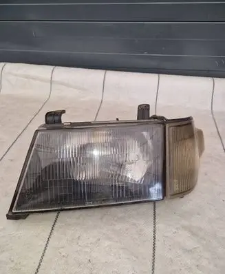 Mitsubishi Pajero Sport I Headlight/headlamp 12057194
