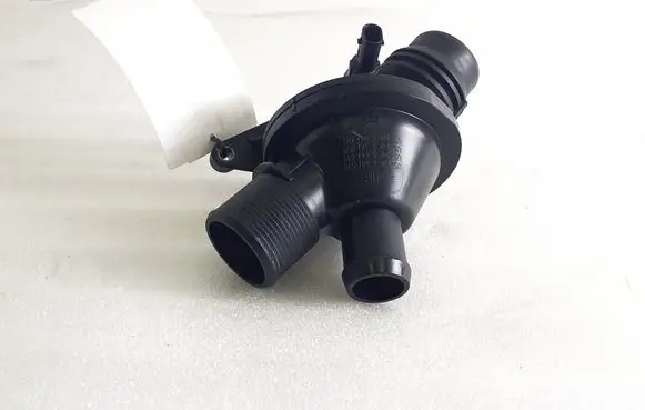 Thermostat/thermostat housing