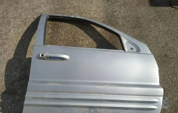 Jeep Grand Cherokee (WJ) Front door pilkos