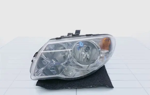 Chrysler Grand Voyager IV Headlight/headlamp 04857831AC