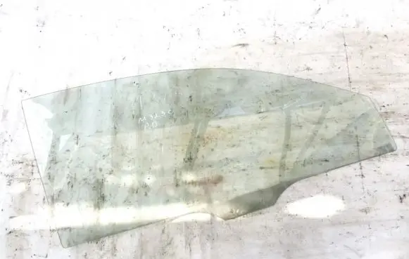 Mazda 323 Front door window glass four-door