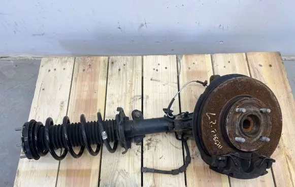 Ford Fiesta Front shock absorber with coil spring H1BC18K001RB