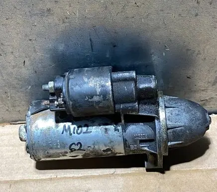 Mercedes-Benz 190 W201 Starter motor 0001108003 M102 1005821056