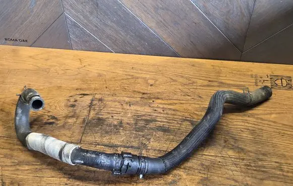 Engine coolant pipe/hose
