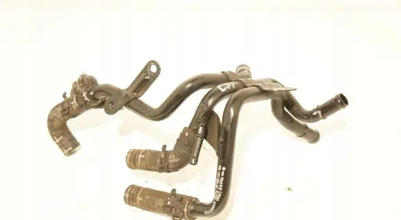 Volkswagen Golf VII Engine coolant pipe/hose 04L121064AF