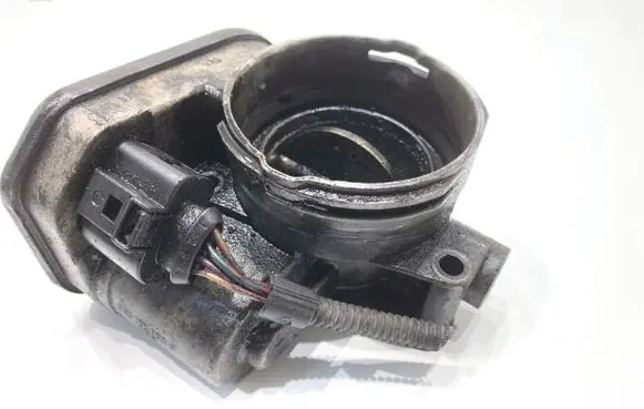 Volkswagen Touran I Engine shut-off valve 038128063G
