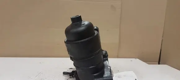 Oil filter mounting bracket