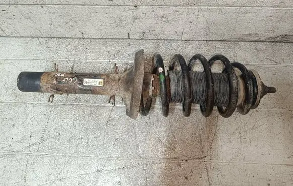 Volkswagen Golf IV Front shock absorber with coil spring 1J0413031AE
