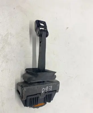 Front door check strap stopper