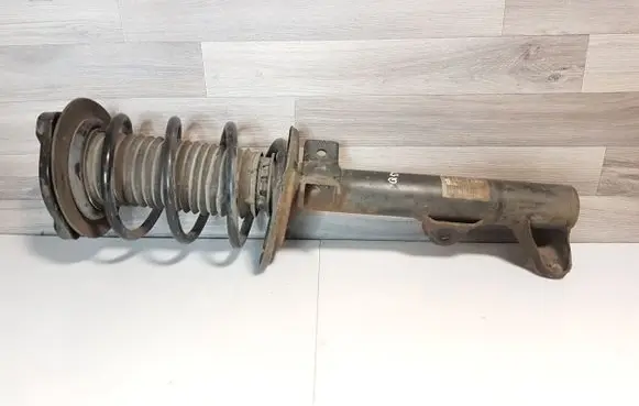 Mercedes-Benz E C207 W207 Front shock absorber with coil spring A2043233000