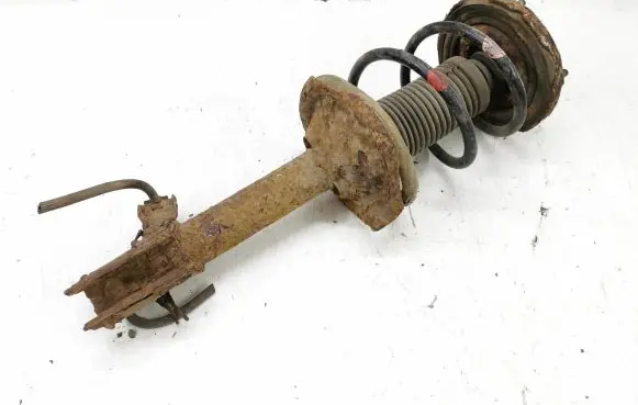 Nissan X-Trail T30 Front shock absorber with coil spring