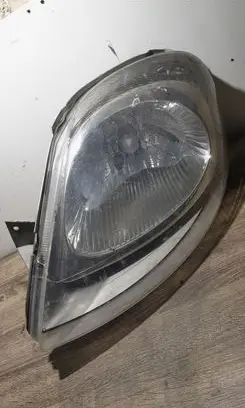 Opel Vivaro Headlight/headlamp 7700311373