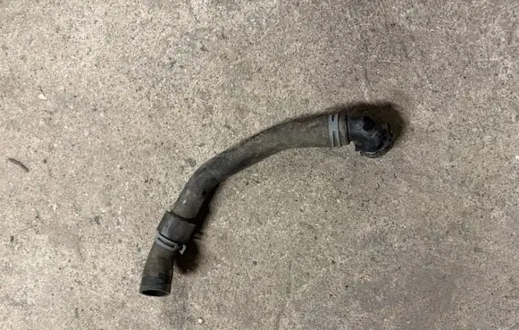 Volkswagen Golf VII Engine coolant pipe/hose 5Q0122101CM