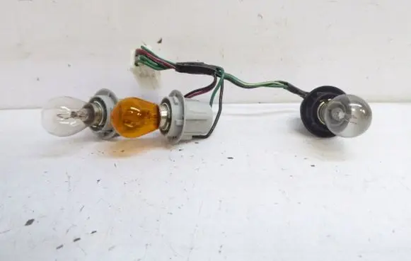 Mitsubishi Colt Tail light bulb cover holder