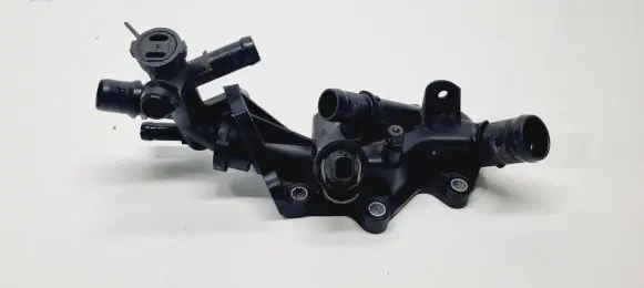 Thermostat/thermostat housing