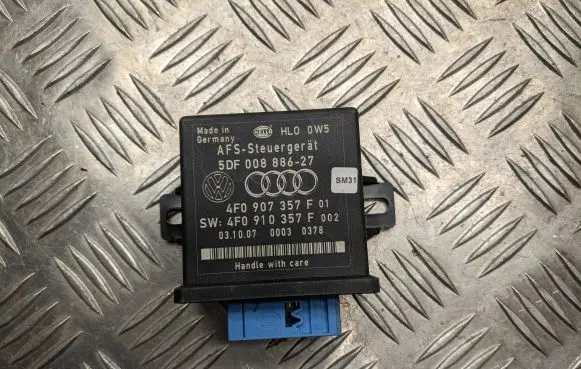 Audi Q7 4L Light module LCM 4F0907357F 5DF00888627 4F0910357F