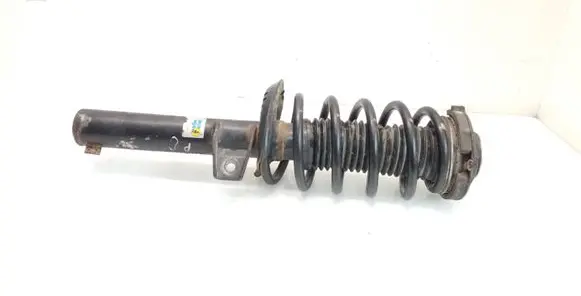 Volkswagen Caddy Front shock absorber with coil spring