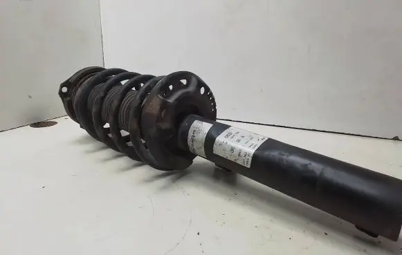 Front shock absorber with coil spring