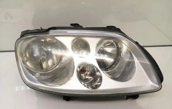 Volkswagen Touran I Headlight/headlamp 1T0941006G 0301205602