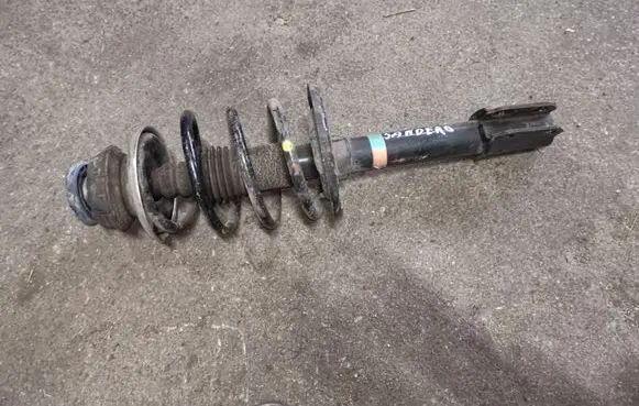 Dacia Sandero Front shock absorber with coil spring