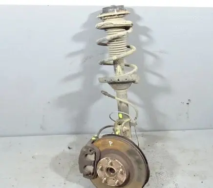 Subaru Legacy Front shock absorber with coil spring