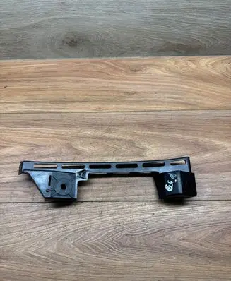 Volkswagen Touran I Front bumper mounting bracket 1T0807890B