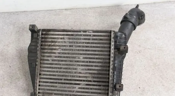 Volkswagen Touareg I Intercooler radiator 7L0145803A