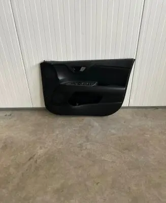 Front door card panel trim