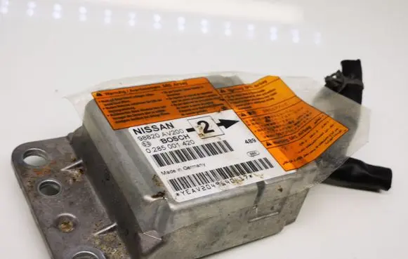 Nissan Primera Airbag control unit/module 98820AV200 0285001420 489