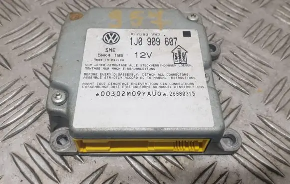 Volkswagen PASSAT B5 Airbag control unit/module 1J0909607 5WK4199