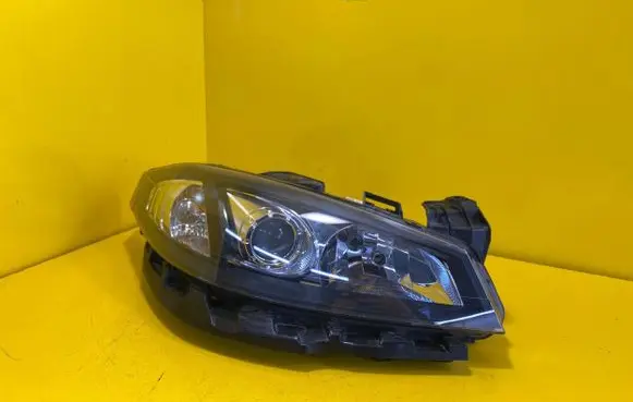 Renault Laguna III Headlight/headlamp 89900422